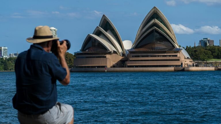 Man Photographing the Sydney Opera House
