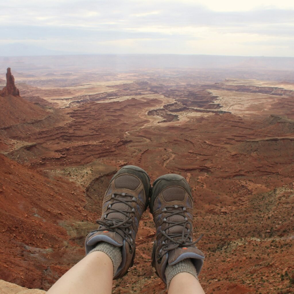 Feet of a Hiker Wearing Brown Hiking Boots