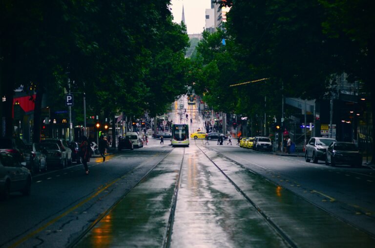 black-and-yellow-bus-on-asphalt-road and one of tourist attractions in Melbourne
